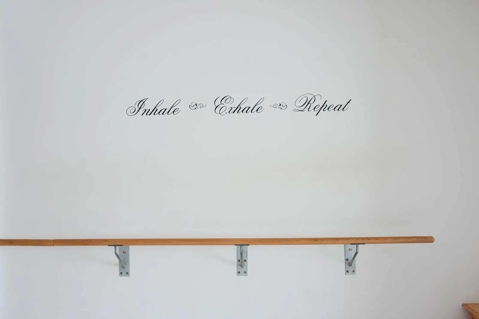 Inhale, exhale, repeat — the barre studio wall